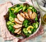Air fryer-cooked chicken breasts in a salad