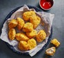 Air-fryer chicken nuggets with ketchup alongside