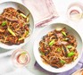 Healthy beef chow mein served in two dishes