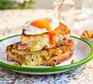 Blue cheese, ham & egg toastie on a plate