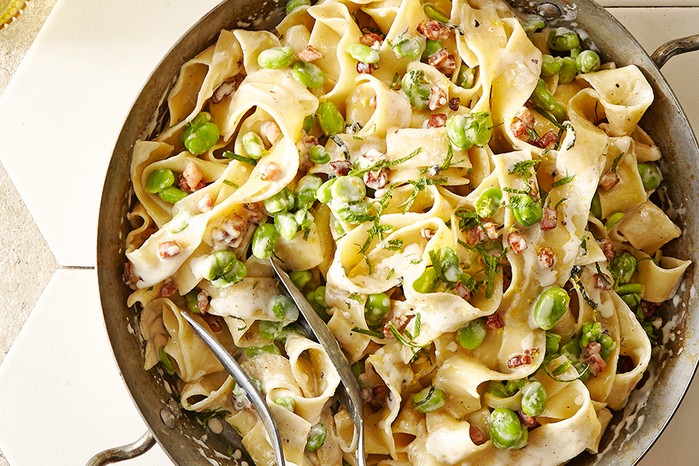 Broad bean pasta with bacon, cream & mint A wok serving broad bean pasta with bacon, cream & mint
