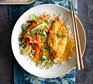 Chicken katsu curry with ribbons of vegetables and rice