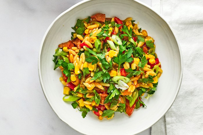 Chorizo, orzo & sweetcorn summer stew Chorizo, orzo & sweetcorn summer stew in two bowls