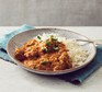 Chicken curry with rice on plate