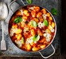 Chorizo and mozzarella gnocchi bake in a casserole dish