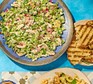 A bowl of green chicken salad