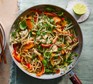 Healthy chicken pad Thai in a wok