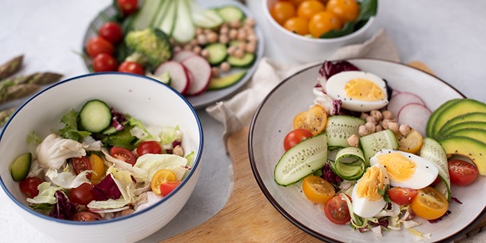 What is a calorie deficit? Bowls of tasty and healthy looking salads