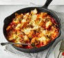 Meatball & garlic bread traybake in a frying pan