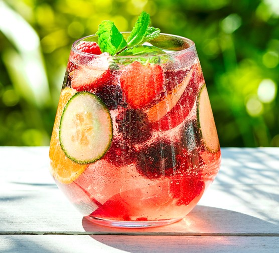 Summer cup mocktail Summer mocktail in glass with fruit and ice