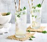 Virgin mojito mocktails in glasses with paper straws