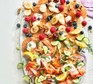 Breakfast pancake platter with a variety of toppings