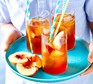 Peach iced tea served on a tray