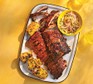 Piri-piri pork ribs with charred sweetcorn and slaw
