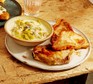 A serving of pork chop with creamy leeks