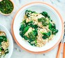 Chicken and broccoli on rice in bowl with salsa