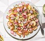 Roast new potatoes & radishes served on a sharing platter