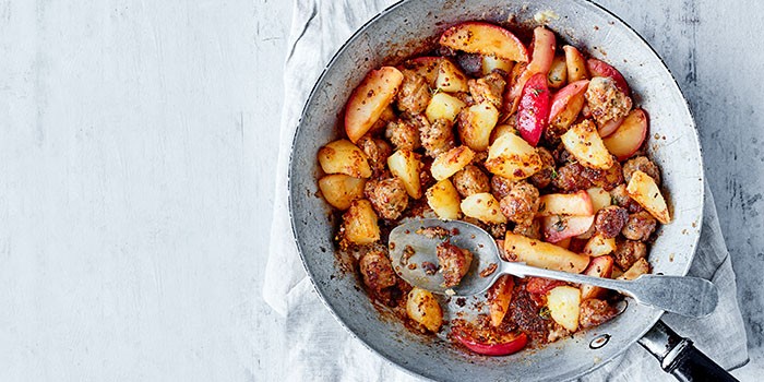 Sausage, mustard & apple hash in a silver pan