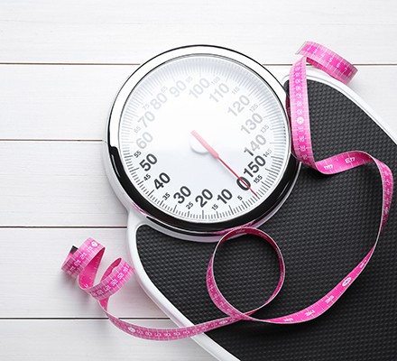 Bathroom scales and a measuring tape