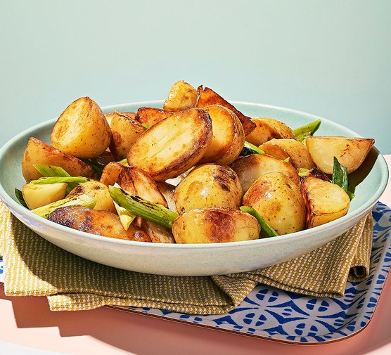 Smoky new potatoes with charred spring onions