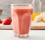 Strawberry smoothie served in a tall glass