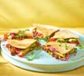 Several spicy bean & avocado quesadillas on a plate