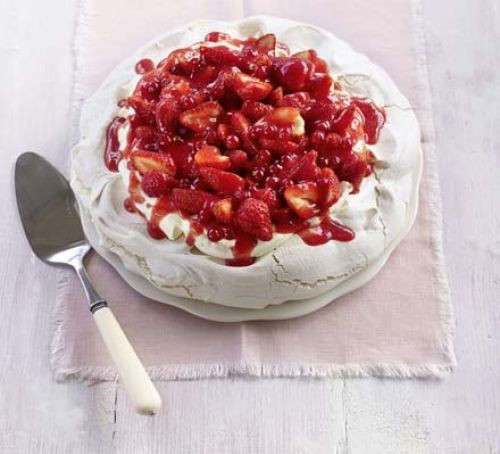 Pavlova cake topped with strawberries