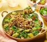 Super-green gnocchi with garlic breadcrumbs served in a baking dish
