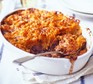 Veggie shepherd's pie in dish with spoon