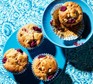 Raspberry muffins on blue plates
